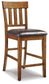 Ralene Counter Height Dining Table and 6 Barstools