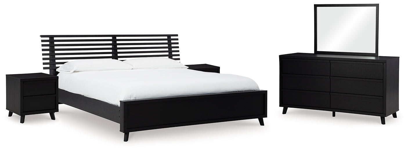 Danziar King Panel Bed with Mirrored Dresser and 2 Nightstands